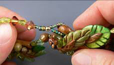 Clay and glass beads on beading wire